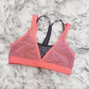 neon peach coral and heathered gray sports bra